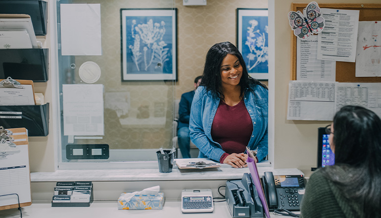 A patient at the front desk