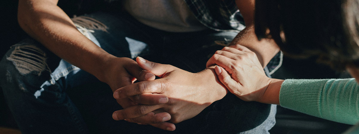 hands holding during therapy support group